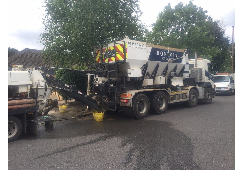 Volumetric concrete lorry & concrete pump end of job tidy up