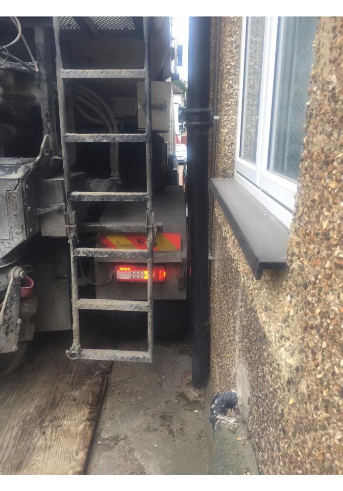 Concrete lorry squeezed tightly right