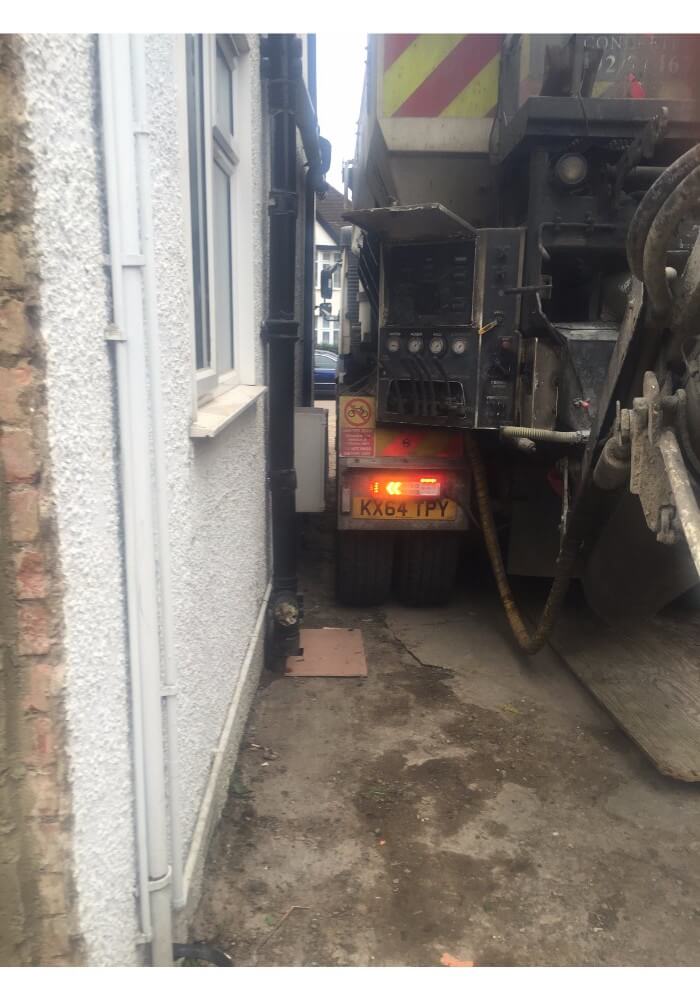 Concrete lorry squeezed tightly left
